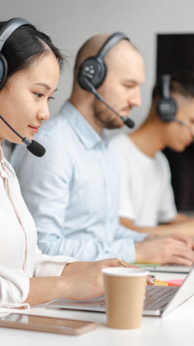 Call centre agents with headsets